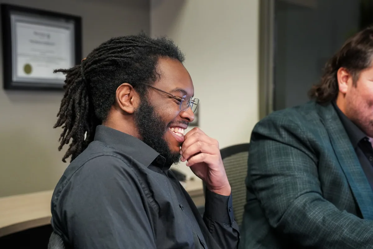 Team member in conversation at the office